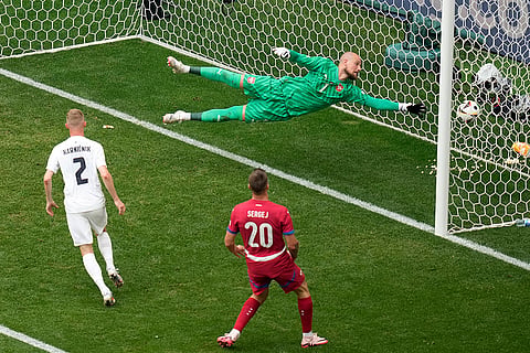 Slovenia's Zan Karnicnik scores the opening goal 